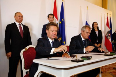 Russian President Vladimir Putin and former Austrian Chancellor Sebastian Kurz attending the signing of a cooperation agreement by Gazprom CEO Alexey Miller (front left) and former OMV CEO Rainer Seele (front right) in 2018.<small>© OMV Aktiengesellschaft</small>